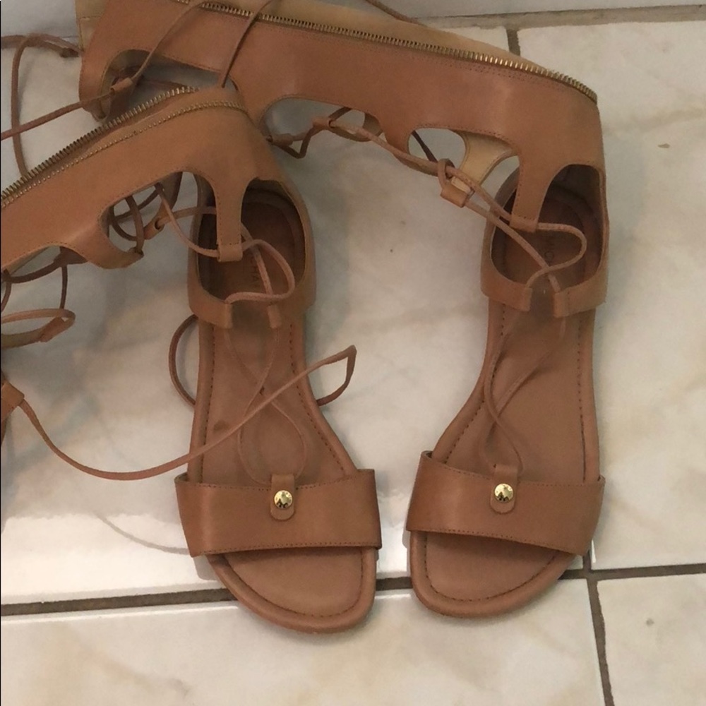 Michael Kors gladiator sandals.